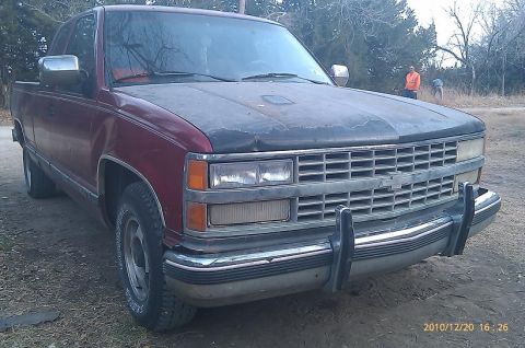 2000 Mercury Grand Marquis - This pickup truck has a distinctive grille and front bumper design.