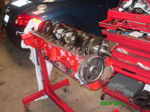 1982 Ford Bronco - Crankshaft getting installed in block.