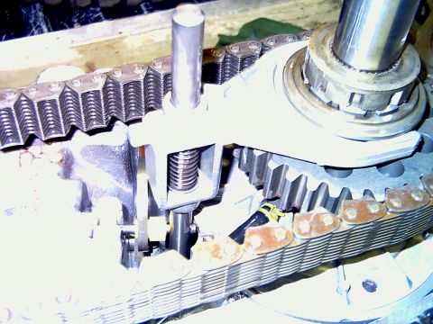 1986 Ford F-150 - This image shows the internal components of a vehicle's transfer case, specifically the chain and gears.