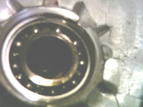 1986 Ford F-150 - A detailed view of a vehicle's wheel bearing assembly, showing internal components.
