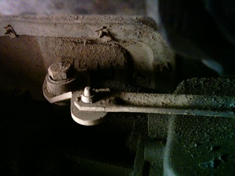1986 Ford F-150 - Transfer case linkage detail, likely from a 1980s era truck.