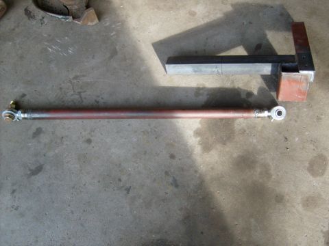1986 Ford Bronco - Custom suspension component with rod ends, likely for off-road or performance modification.