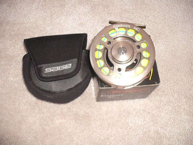 Sage fishing reel with black protective pouch and box