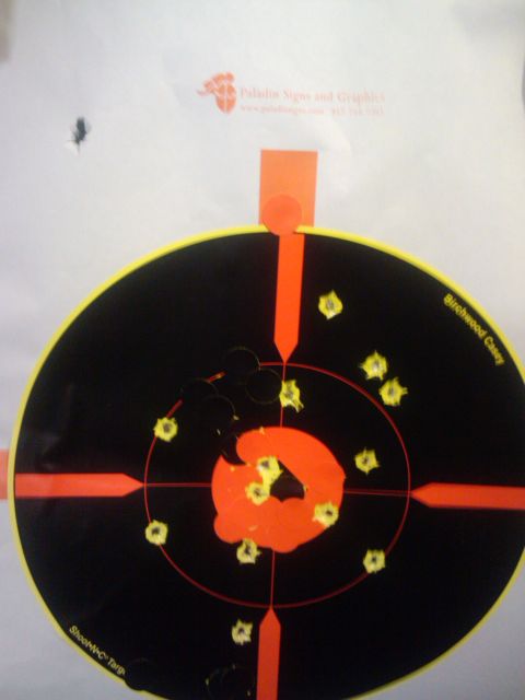 1989 Ford Bronco - Target shows numerous bullet impacts, indicating practice or qualification.