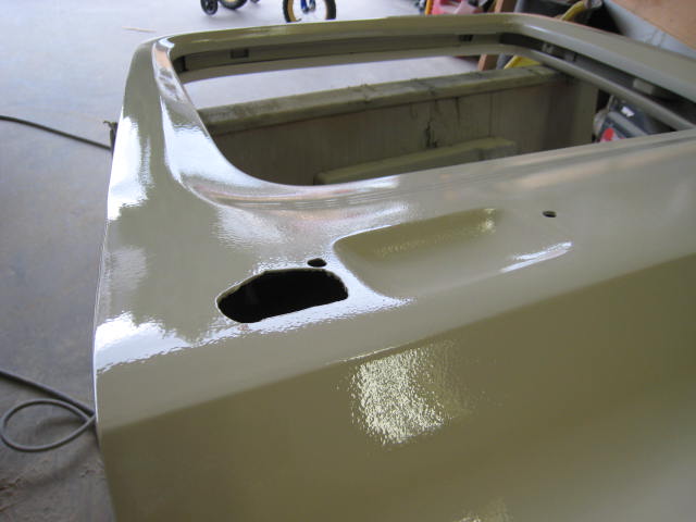 1976 Ford F-250 truck bed corner with primer applied
