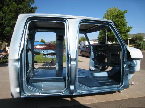 1976 Ford F-250 - The bare cab of a Ford F-Series truck is shown outside, ready for its restoration process.