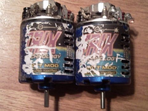 1989 Ford Bronco - Two HPI GT MOD brushed RC car motors are shown, likely for a remote control vehicle.