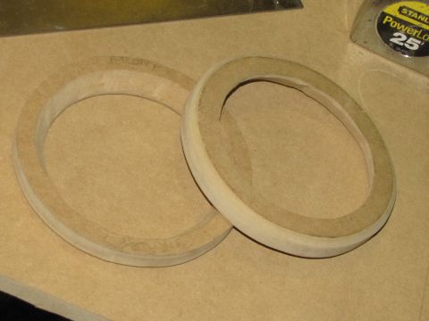 1993 Ford F-250 - Wooden rings are used for mounting speakers, likely for a car stereo installation.