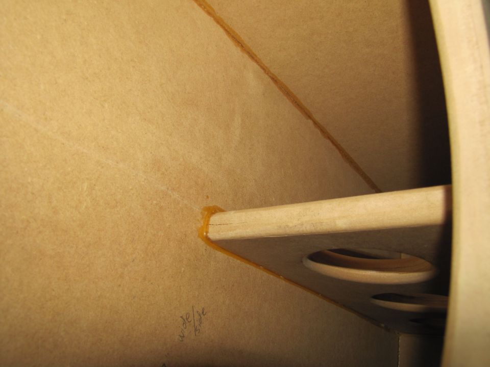 Interior of a vehicle's sub box with visible text '30/30'