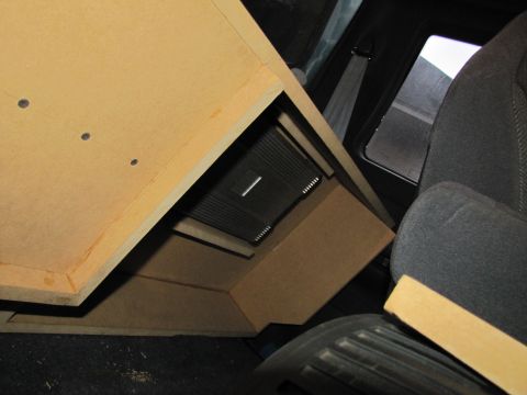1993 Ford F-250 - Custom subwoofer box and amplifier installed in the interior of a vehicle.