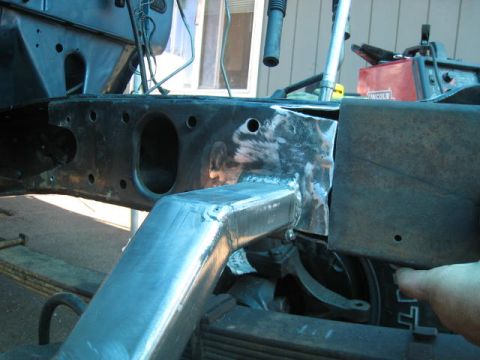 1976 Ford F-250 - Frame modification in progress, showing custom metal fabrication and welding work.
