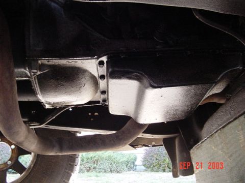 1979 Ford Bronco - Underside view of vehicle components, including exhaust and differential. Photo dated September 21, 2003.