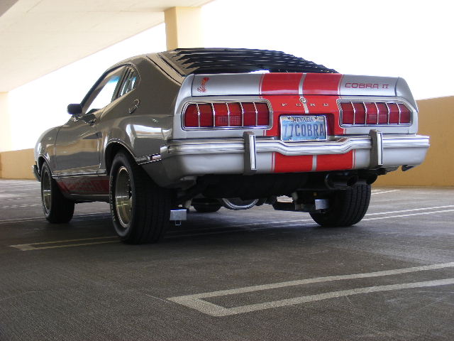 Silver and red 1977 Ford Mustang II Cobra II rear view with Nevada license plate "77 COBRA"
