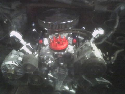 1991 Ford Bronco - Engine bay detail showing a V8 engine with aftermarket components.