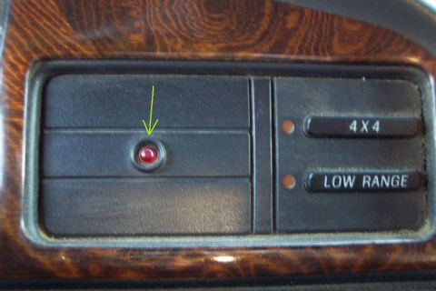 1995 Ford Bronco - Interior view of a 1995 Ford Bronco dashboard, highlighting the 4x4 and low range controls.