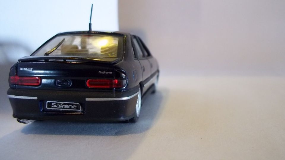 Black Renault Safrane model car, rear view with Safrane plate and badging