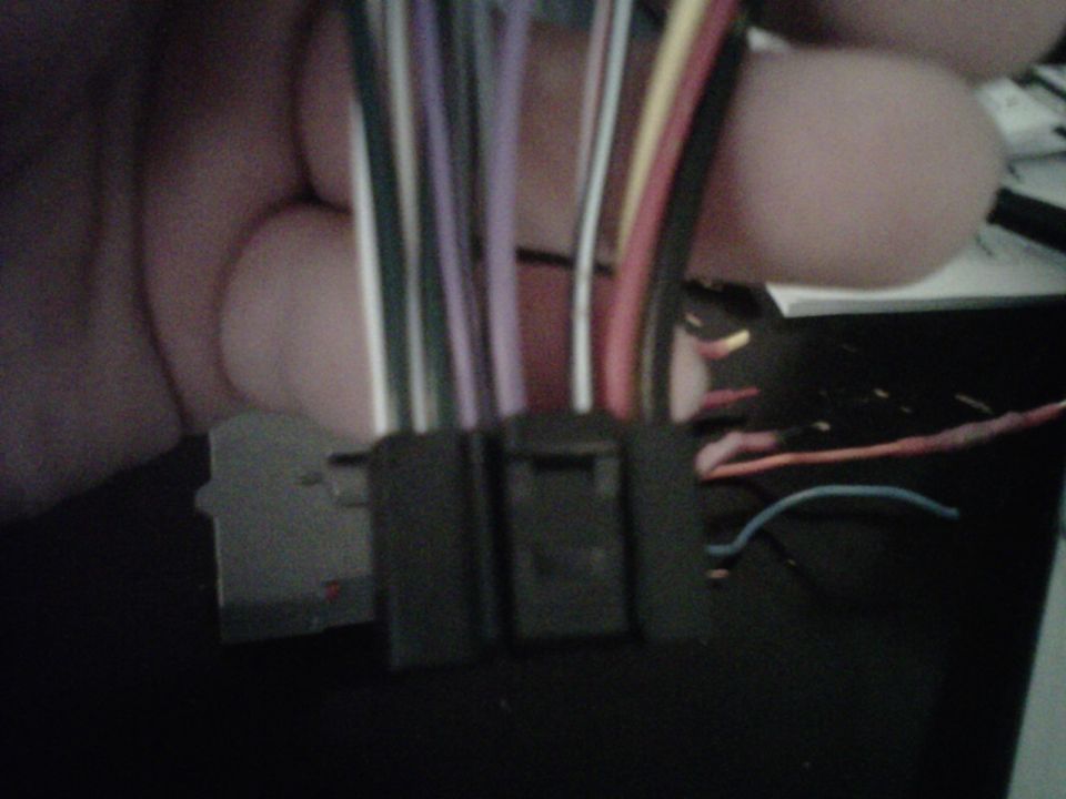 Wiring harness connector with multiple colored wires