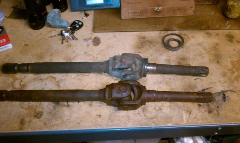 1994 Ford F-150 - These are both outer passengerside axle shafts. The one on top came outta the truck. It had a pretty good groove where the spindle bearing…