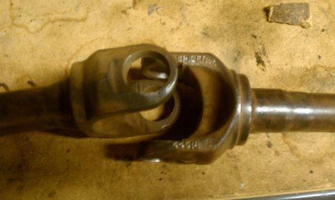 1994 Ford F-150 - Driveshaft U-joint with visible part numbers, likely from a Ford truck.