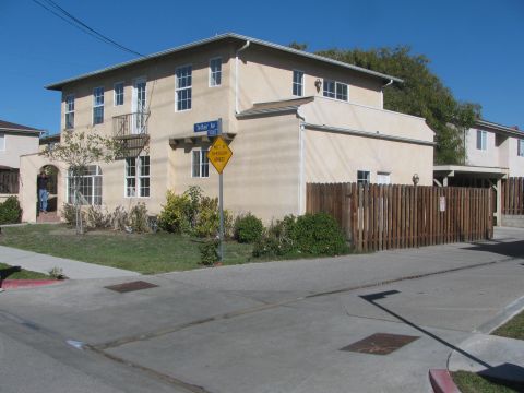 1968 Ford Mustang - A two-story building is visible on a sunny day, with street signs indicating Tellair Ave and a no through street.