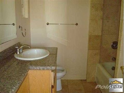 1968 Ford Mustang - A bathroom scene with a vanity, sink, toilet, and bathtub is visible.