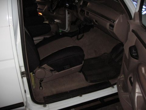 1995 Ford Bronco - The interior of a truck is shown, focusing on the driver's seat and dashboard area.