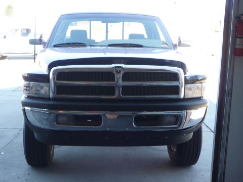 1997 Dodge 2500 - Front view of a 1997 Dodge 2500 pickup truck, showing the grille and headlights.