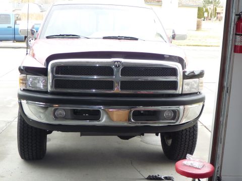 1997 Dodge 2500 - Front view of a 1997 Dodge 2500 pickup truck parked in a garage.