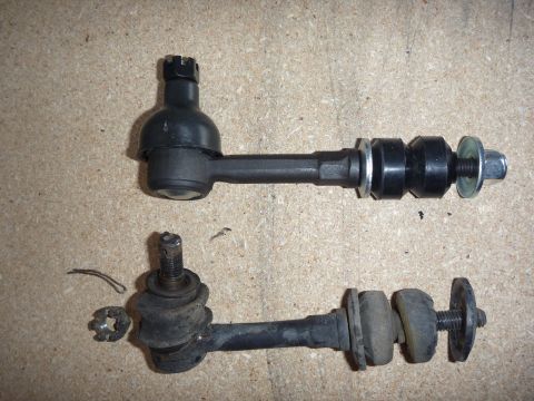 1997 Dodge 2500 - Comparison of a new and an old suspension stabilizer bar link, with associated hardware.