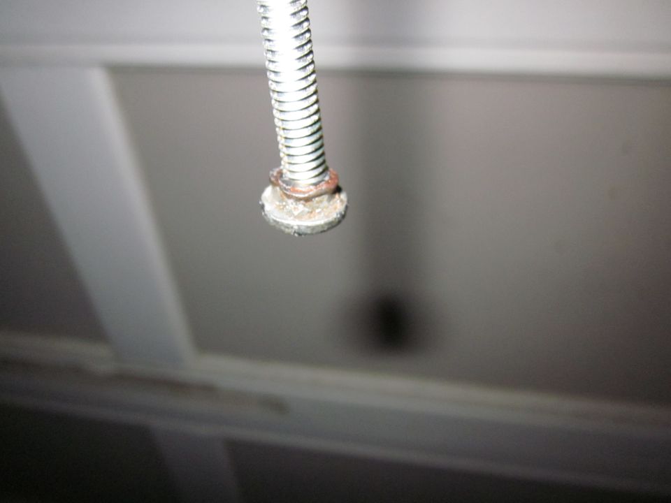 Close-up of a bolt with a washer