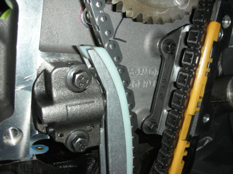 1992 Ford Crown Victoria - Engine timing chain, tensioner, and gear assembly detail. Some part numbers are visible.