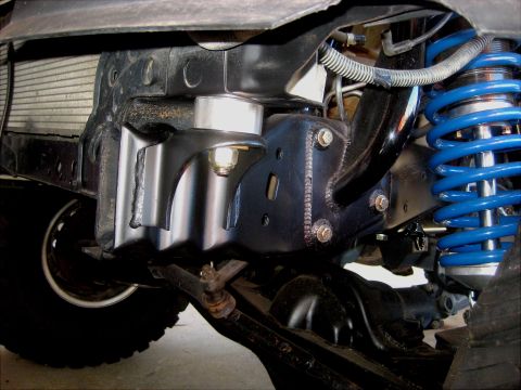 1996 Ford Bronco - Detailed view of the undercarriage, focusing on suspension and frame modifications.