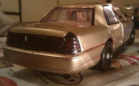 2000 Mercury Grand Marquis - Model car replica of a 2000 Mercury Grand Marquis, viewed from the rear.
