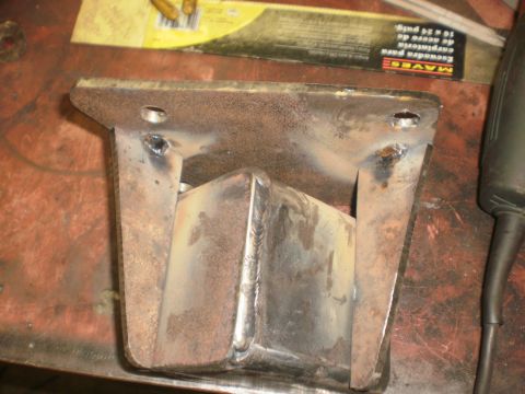 1995 Ford Bronco - Custom welded metal bracket, likely for vehicle suspension modification.