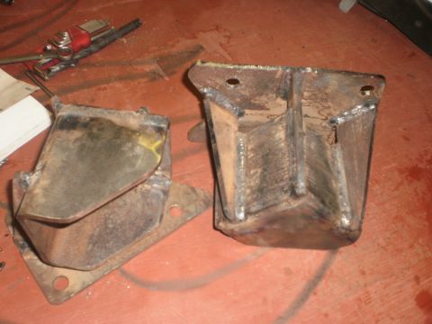 1995 Ford Bronco - These custom metal brackets appear to be for a vehicle suspension modification.