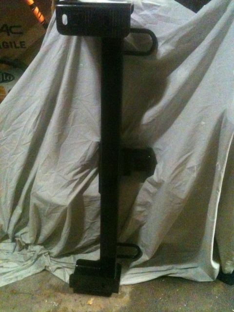 1996 Ford Bronco - A black front receiver hitch is shown, likely for a truck or SUV, with loop mounts for accessories.