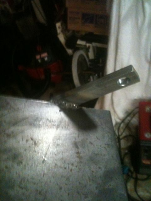 1996 Ford Bronco - A close-up view of a welded metal part, with the Supermotors.net logo in the lower right corner.