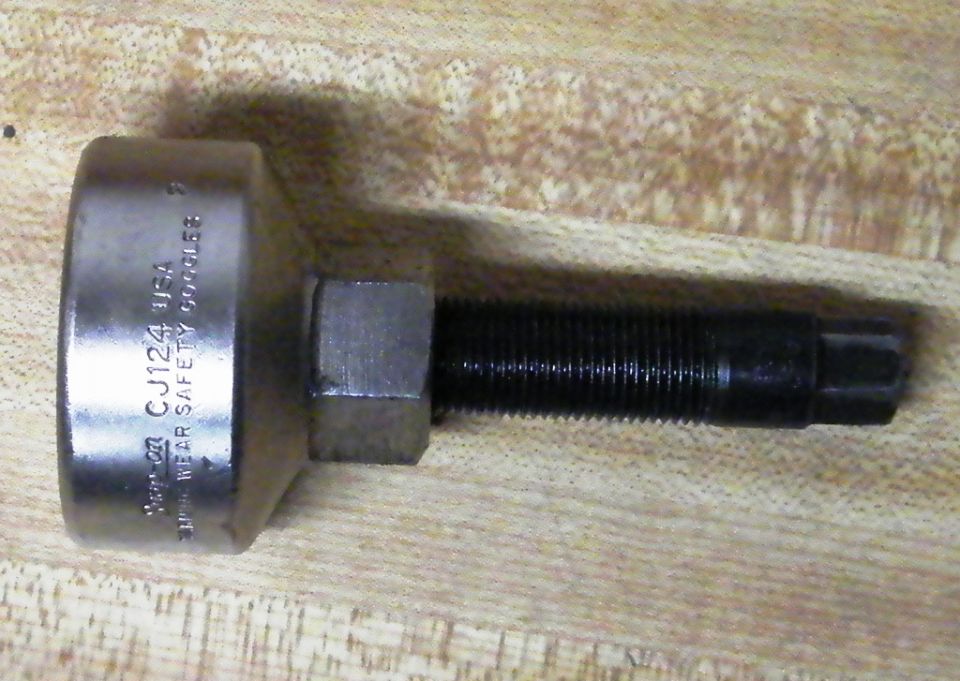 Snap-on CJ124 threaded puller tool with hex collar and splined tip on cloth