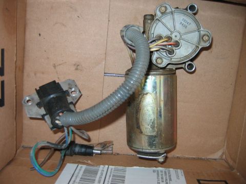 1992 Ford Bronco - This is a power window motor assembly, possibly for a Ford vehicle, with visible part numbers.