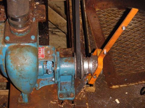 1991 Ford Bronco - This image shows a close-up of a belt-driven pump assembly, not a 1991 Ford Bronco.