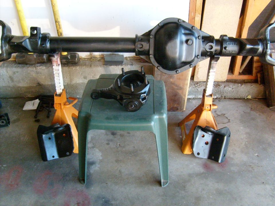 Ford Bronco rear axle assembly on jack stands with differential cover removed