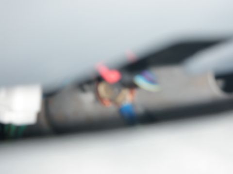 2007 Dodge 2500 - Close-up of electrical wiring and connectors, likely part of a stereo installation.