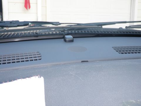 2007 Dodge 2500 - Close-up view of a vehicle's dashboard, showing air vents and windshield wiper assembly.