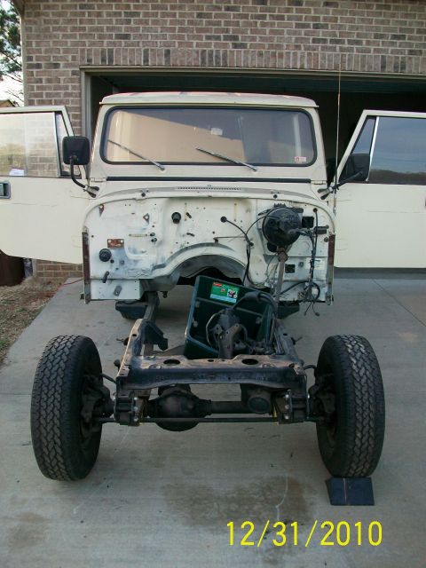 1986 Jeep Wagoneer - This 1986 Jeep CJ-8 Scrambler is shown with its body removed from the frame, revealing the chassis and drivetrain components.