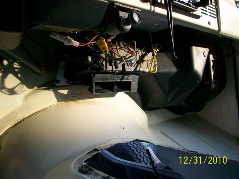 1986 Jeep Wagoneer - The dashboard wiring and HVAC components are visible in this interior shot.