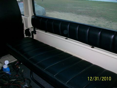 1986 Jeep Wagoneer - Interior view of a vehicle with bench seating and visible wiring. Date stamp indicates 12/31/2010.