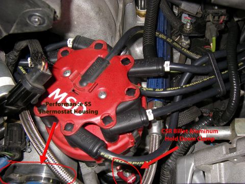 1990 Ford Bronco - Engine bay detail showing a red MSD distributor cap and various hoses and wires.
