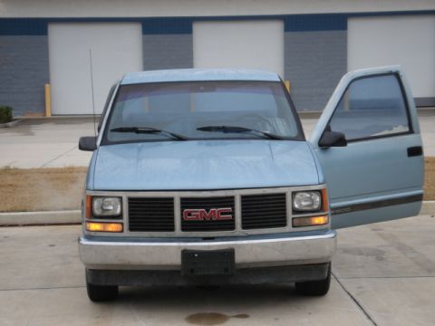 1979 Chevrolet C/K Pickup - This GMC pickup truck features a chrome bumper and a prominent GMC badge on the grille.