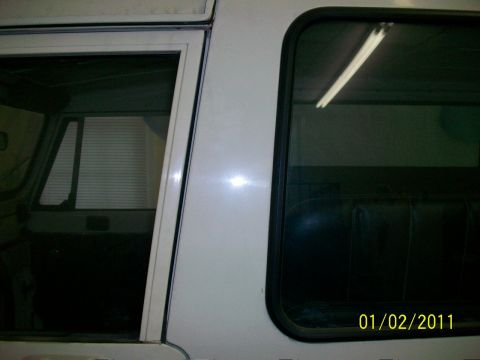 1986 Jeep Wagoneer - This photo shows the side of a Jeep CJ-8 Scrambler, with a date stamp of 01/02/2011.