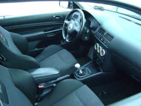 1993 Ford Probe - Interior view shows sport seats, a manual transmission, and the dashboard of a car.